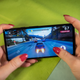 A photo of two hands cradling the Pixel 6a